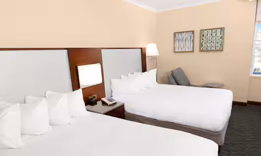 Two beds in a Palmer hotel room